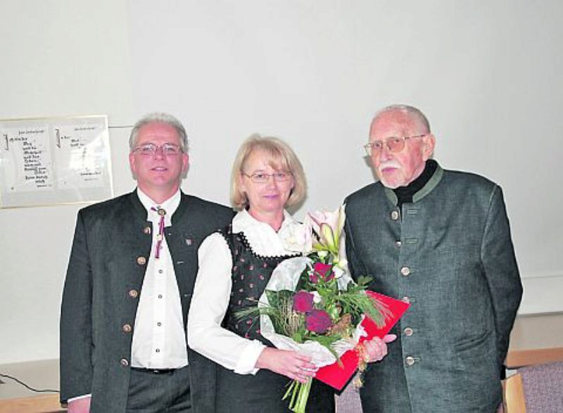 Goldenes Ehrenzeichen und Rosen fr die ...