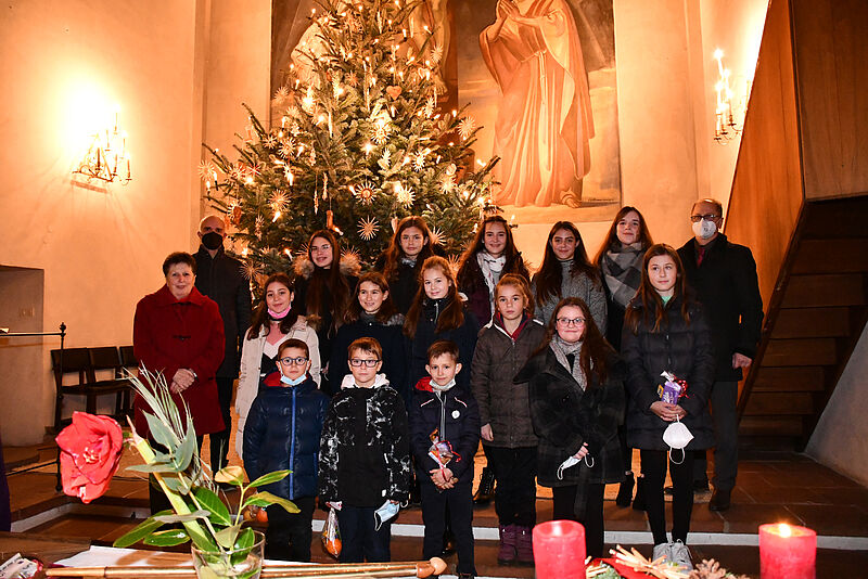 Weihnachtsgottesdienst in Augsburg, vorne links: ...