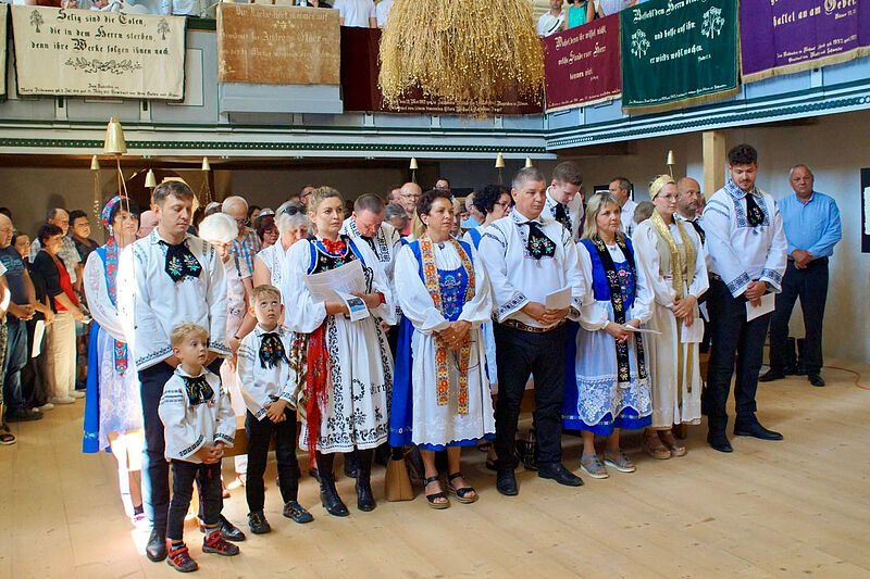 Trachtentrger im Gottesdienst in Almen. Foto: ...