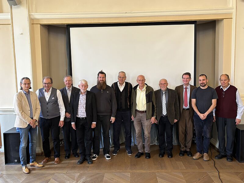 Gruppenfoto der elf Referenten nach der ...